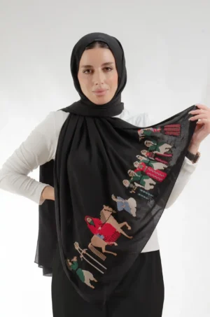 The Palestine Wedding Black Tatreez Shawl is a cozy, well-ventilated embroidered hijab made from chiffon fabric with meticulous handiwork—great for day-to-day wear and celebrations.