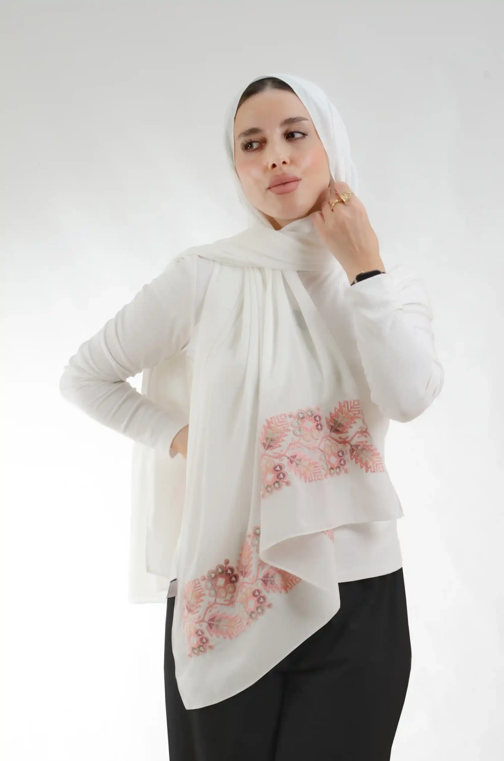 The Pine Pearl Tatreez Shawl is a silky, fresh embroidered hijab made from crepe fabric with delicate stitching—excellent for regular use and dressy affairs.
