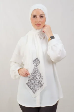 The Navy Blue Hebron Tatreez Shawl is a cozy, breathable embroidered hijab made from Georgette chiffon fabric. Perfect for everyday wear and celebrations.