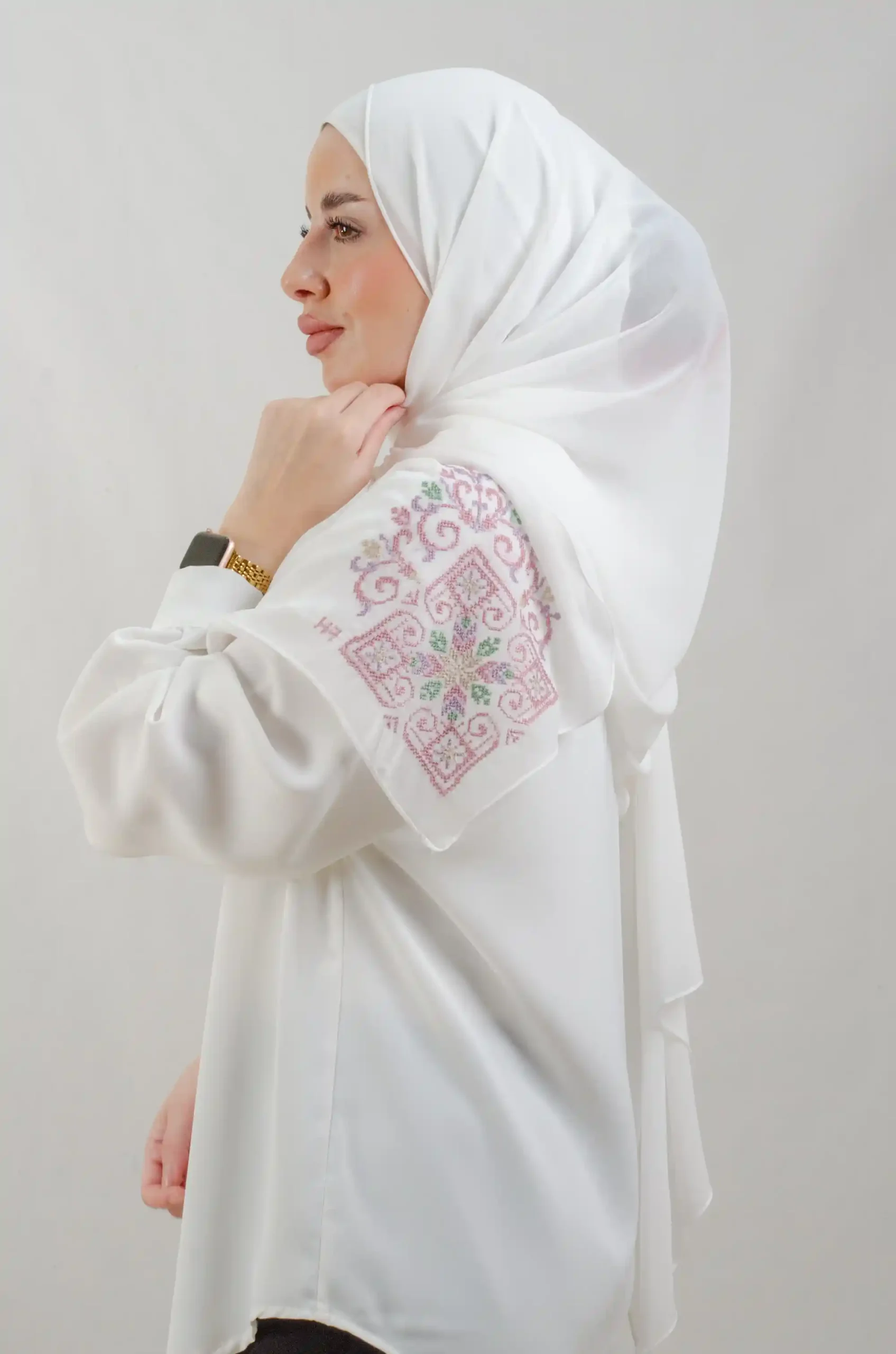The Rose Hebron Tatreez Shawl is a cozy, breathable embroidered hijab made from Georgette chiffon fabric. Perfect for everyday wear and celebrations.