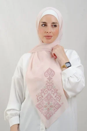 The Dirty rose Hebron Tatreez Shawl is a cozy, breathable embroidered hijab made from Georgette chiffon fabric. Perfect for everyday wear and celebrations.