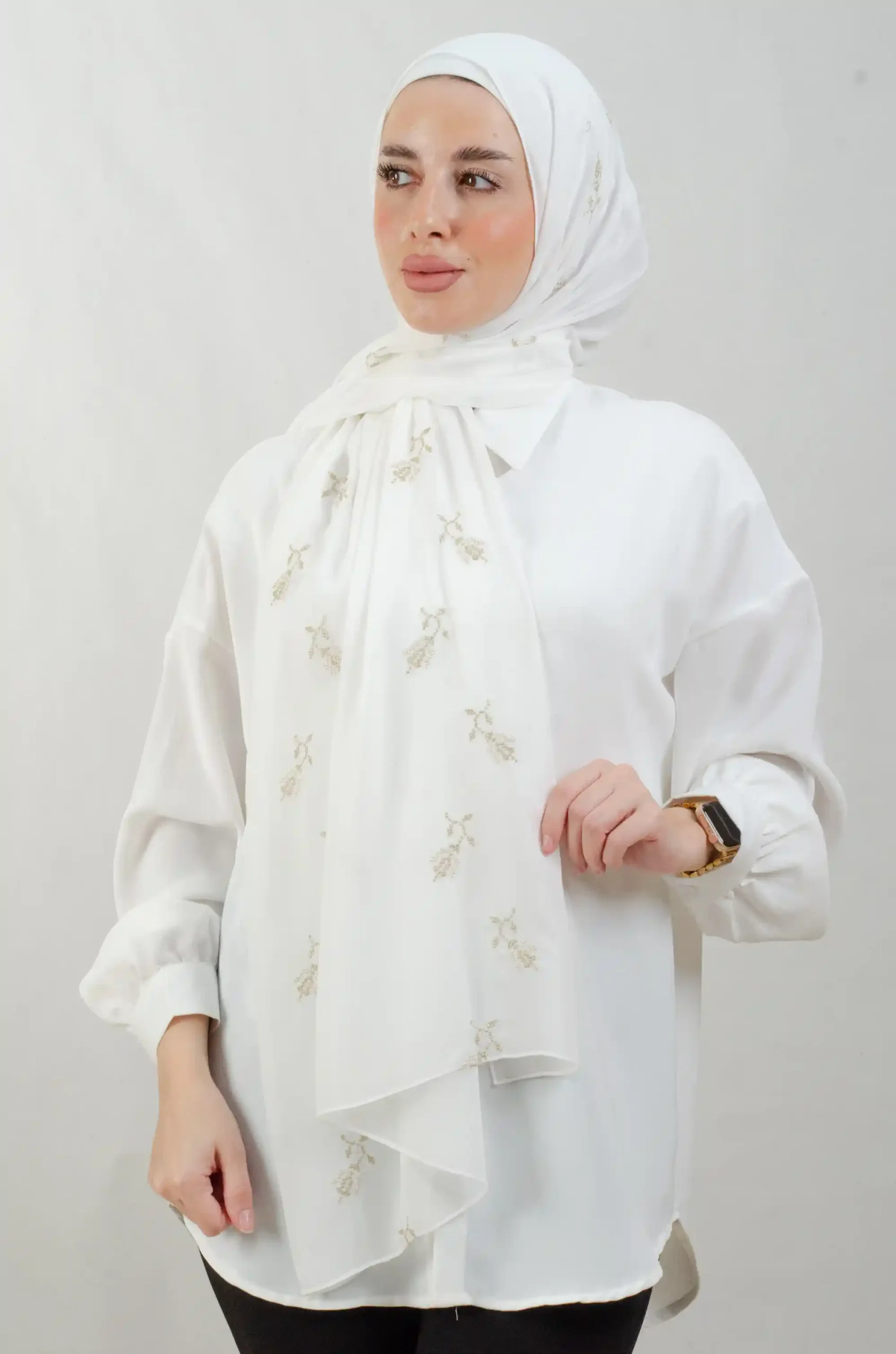 The Lilac Metal Tatreez Shawl is a cozy, breathable embroidered hijab made from Georgette chiffon fabric. Perfect for everyday wear and celebrations.