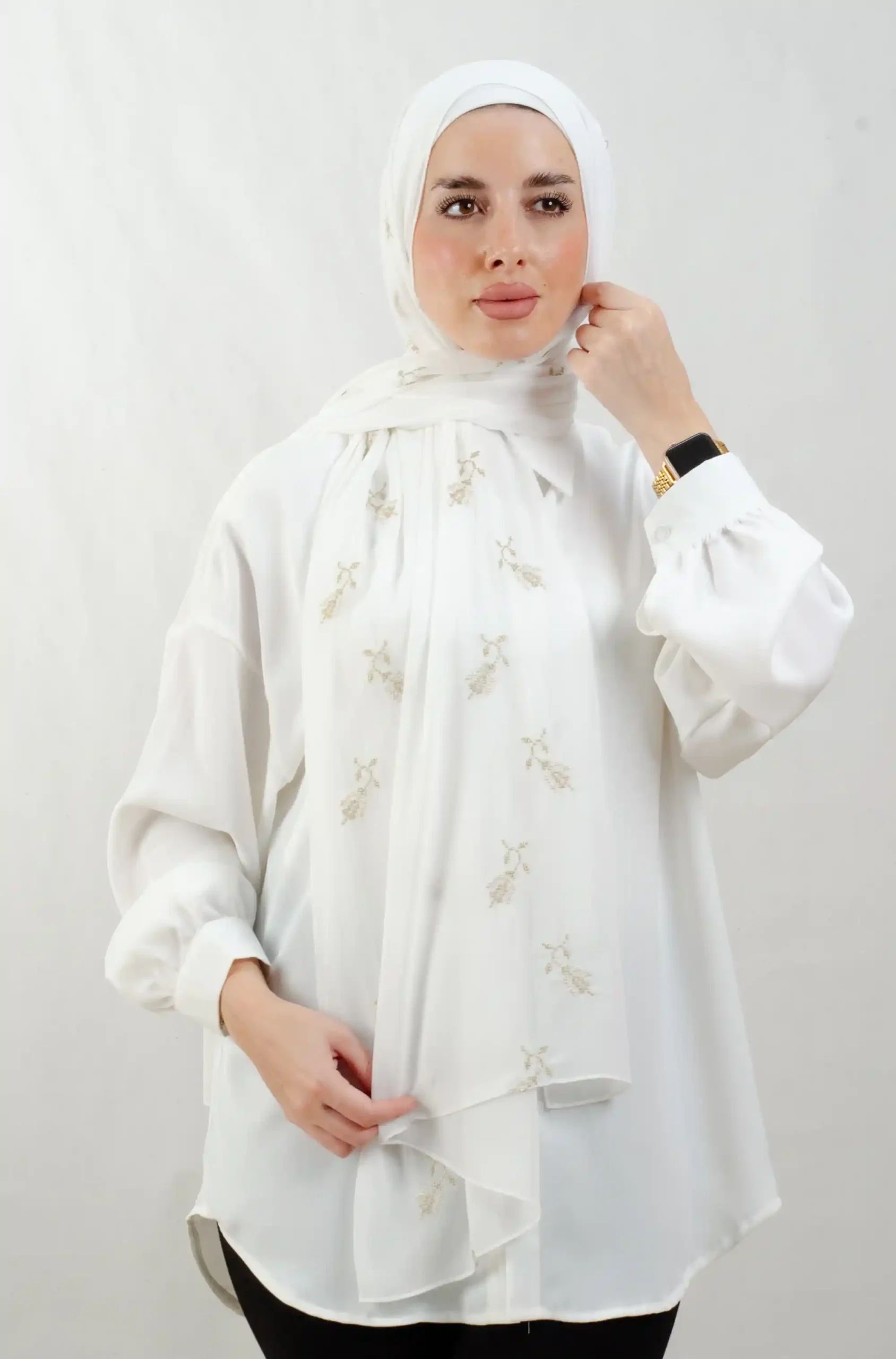 The Lilac Metal Tatreez Shawl is a cozy, breathable embroidered hijab made from Georgette chiffon fabric. Perfect for everyday wear and celebrations.