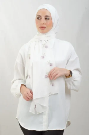 The Lilac Light purple Tatreez Shawl is a cozy, breathable embroidered hijab made from Georgette chiffon fabric. Perfect for everyday wear and celebrations.