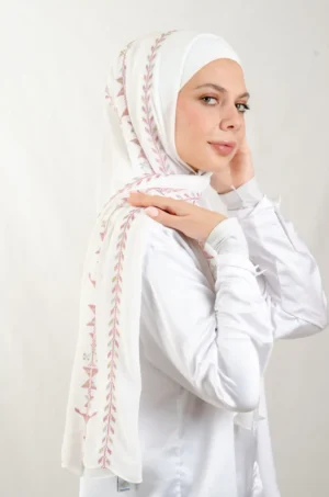 Enjoy the sophisticated style of our Cypress Vine Light pink Tatreez Shawl, designed with premium Georgette chiffon fabric for lasting comfort throughout the day. Featuring delicate Tatreez embroidery in Cypress Vine Light pink, this shawl captures the essence of cultural heritage while embracing a modern aesthetic. With its graceful drape, the Cypress Vine Light pink Tatreez Shawl transitions seamlessly from casual daily wear to refined gatherings. Easy to style and maintain, it adds timeless charm and elegance to any wardrobe.