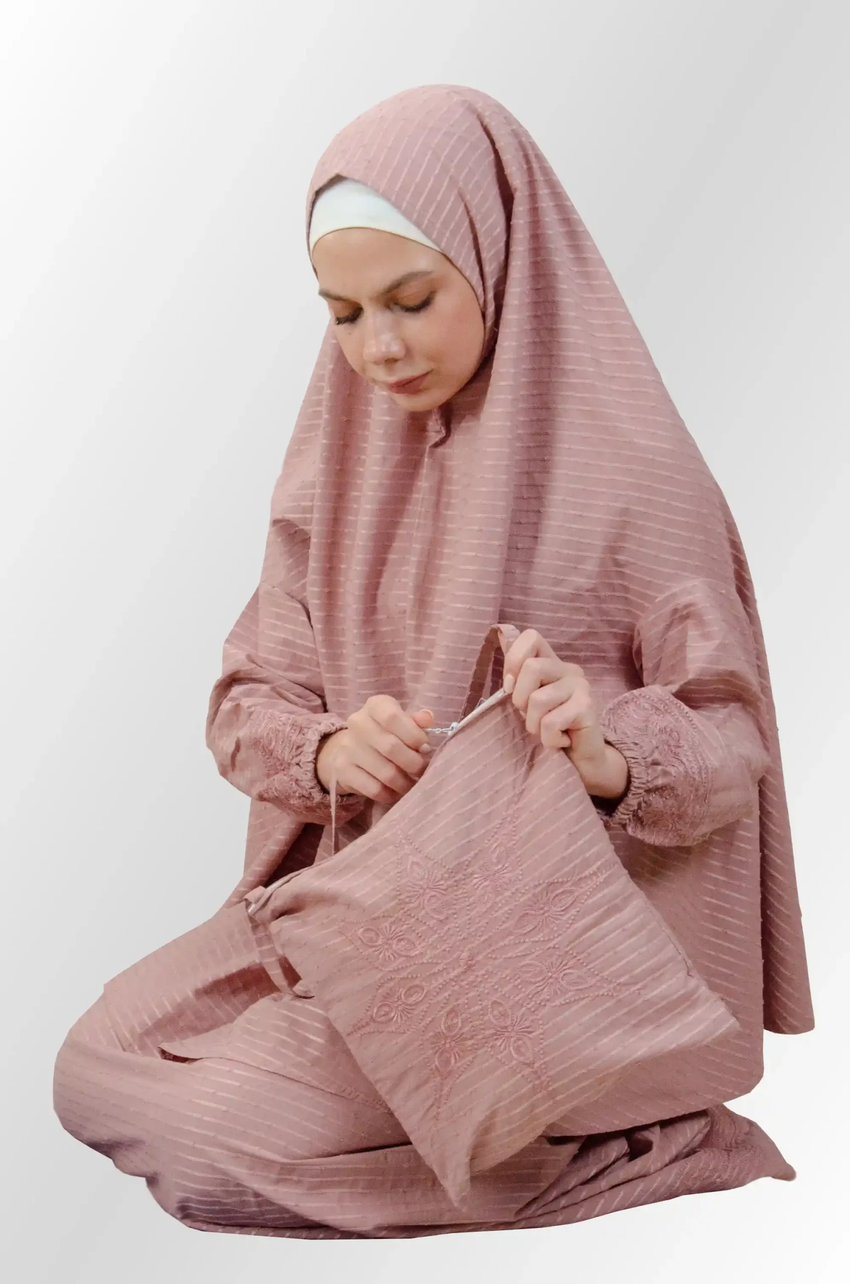Sujood Rose Prayer Set in Dirty Rose — a coordinated two‑piece prayer set crafted from qotton for a light, breathable drape and modest coverage. Comfortable for sujood and ruku, easy to care for, and travel‑friendly; a practical choice for daily worship at home or the mosque.
