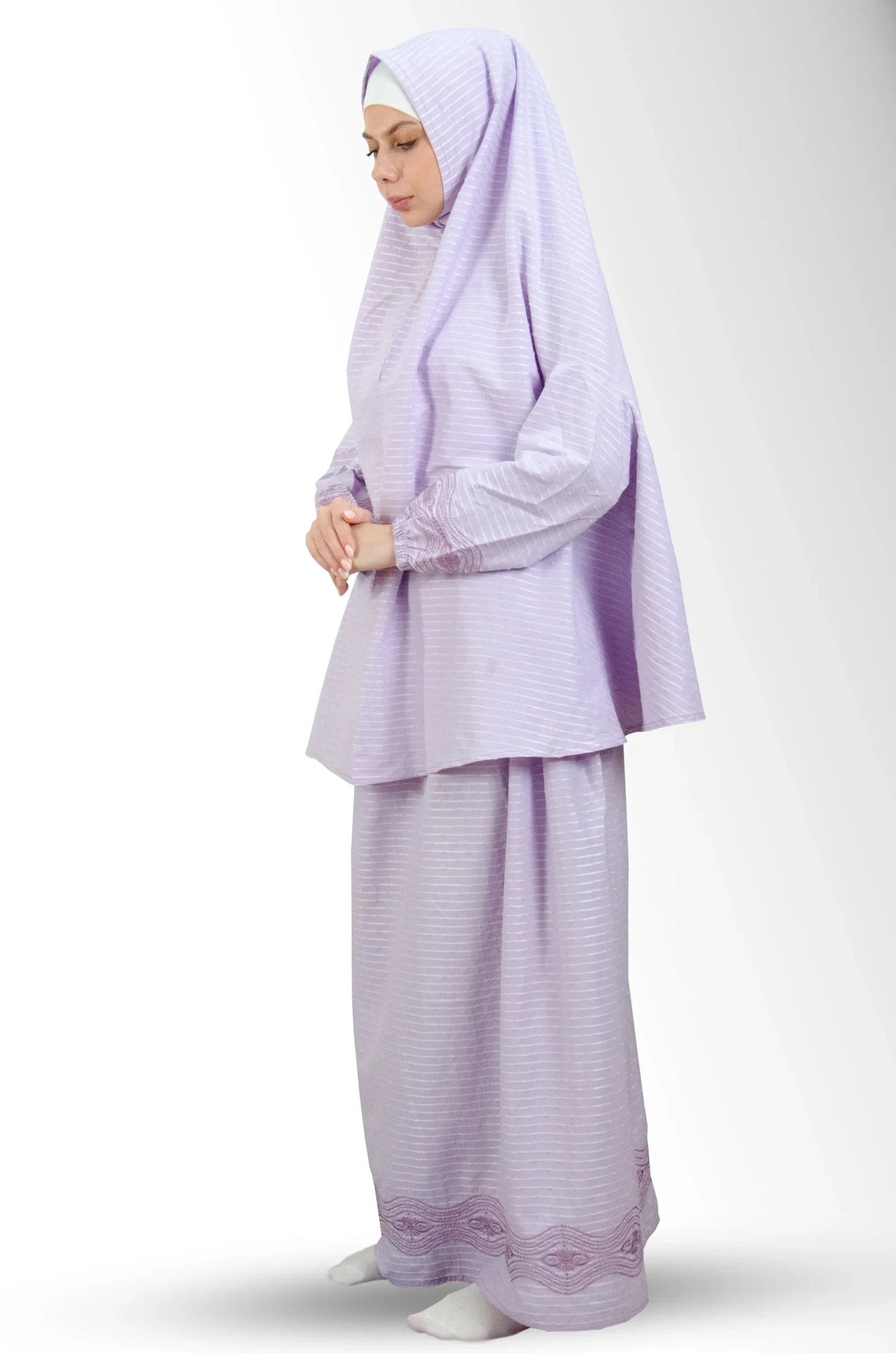 Sujood Purple Prayer Set in Light purple — a coordinated two‑piece prayer set crafted from cotton for a light, breathable drape and modest coverage. Comfortable for sujood and ruku, easy to care for, and travel‑friendly; a practical choice for daily worship at home or the mosque.