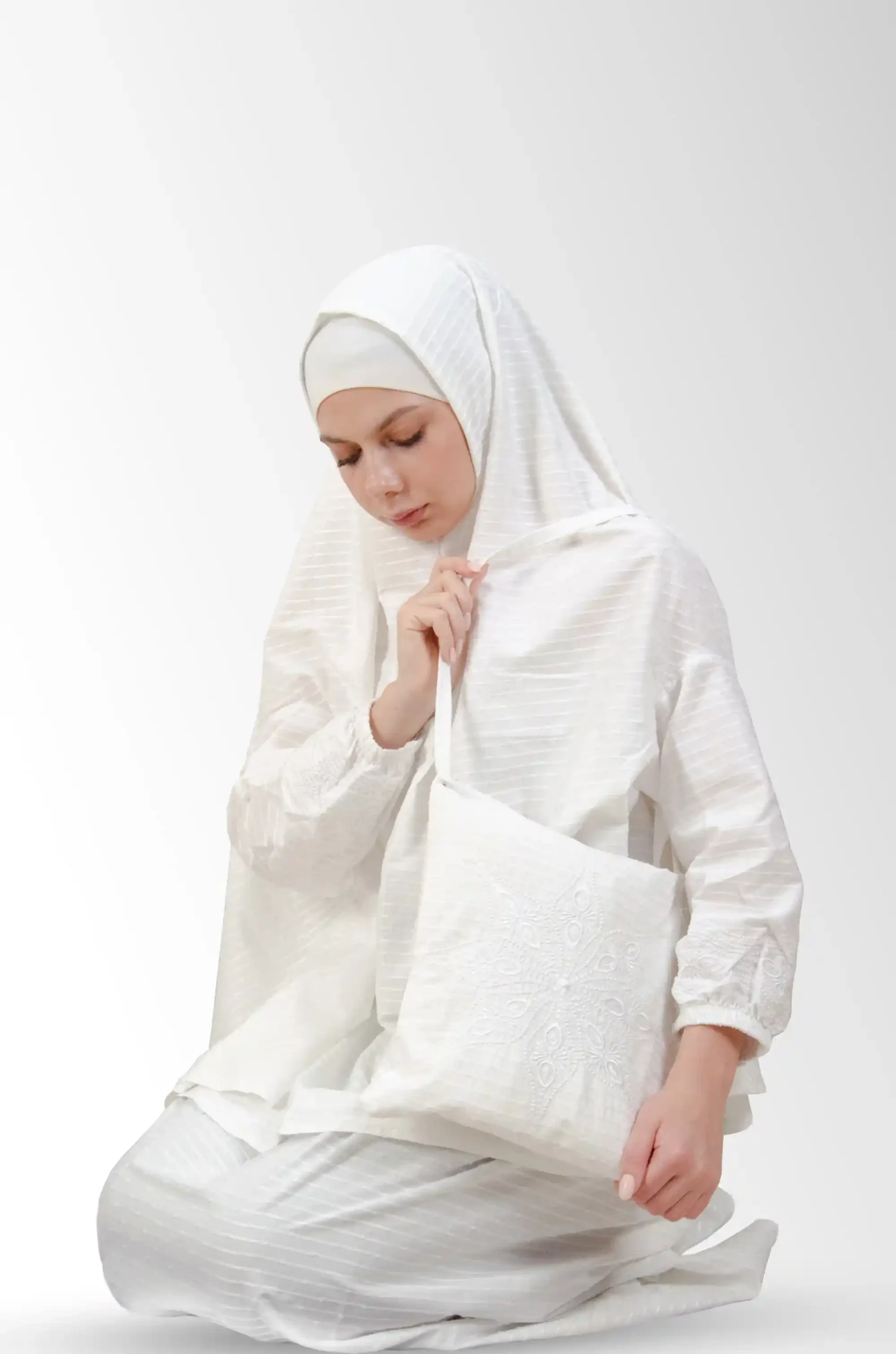 Sujood White Prayer Set in White — a coordinated two‑piece prayer set crafted from qotton for a light, breathable drape and modest coverage. Comfortable for sujood and ruku, easy to care for, and travel‑friendly; a practical choice for daily worship at home or the mosque.