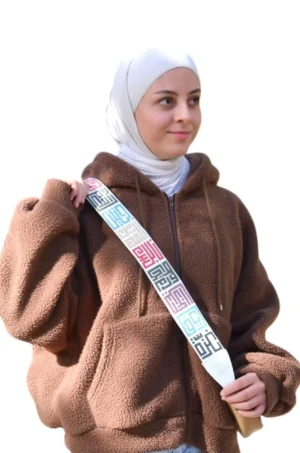 Multicolor - White Palestine Cities Handbag Embroidered Strap – A stylish handbag embroidered strap, crafted with authentic patterns. Standard length (110 cm to 115 cm), lined with premium leather, and finished with high-quality accessories. Durable enough to hold up to 20 kg. Colors used: White, Multi-color.