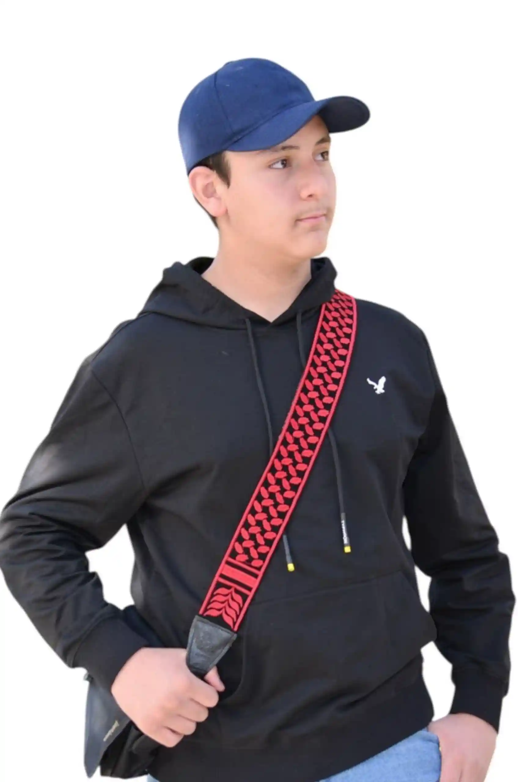 Red - Black Shemagh Handbag Embroidered Strap – A stylish handbag embroidered strap, crafted with authentic patterns. Standard length (110 cm to 115 cm), lined with premium leather, and finished with high-quality accessories. Durable enough to hold up to 20 kg. Colors used: Black, Red.