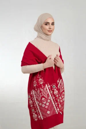 Red Nabati with Snow-White Embroidered Shoulder Shawl in a warm winter design featuring Falahi embroidery, bratto details, and mirror accents inspired by Central Region heritage.