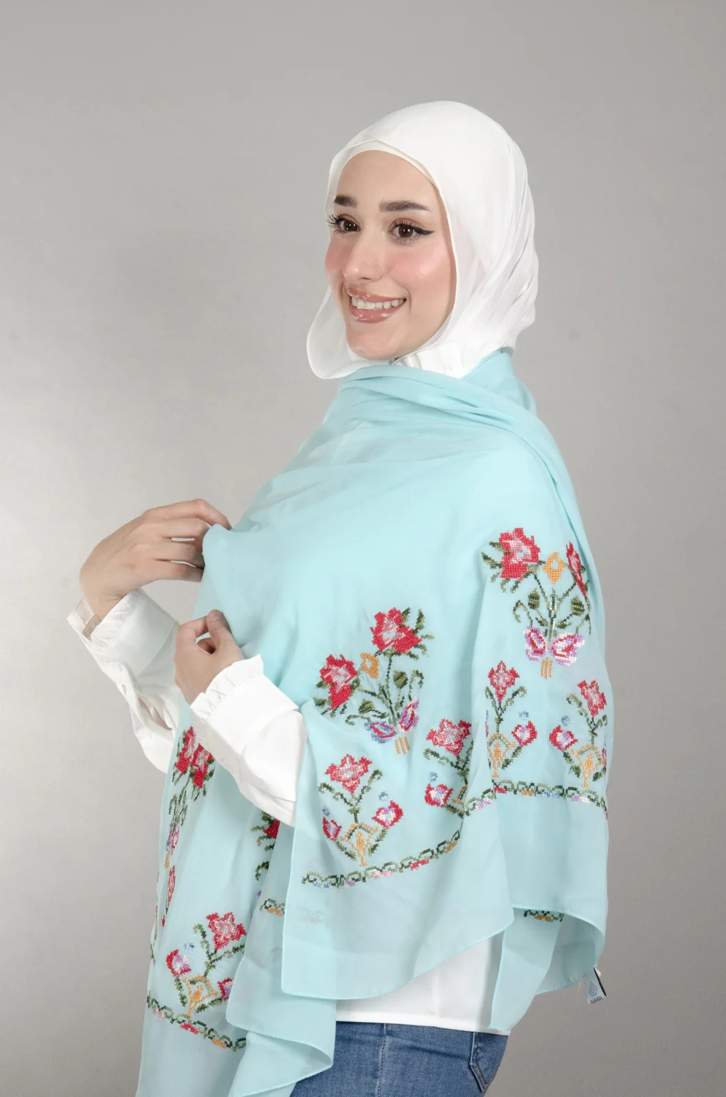Light Blue Henna Shawl made from Duja Al-Lail cotton chiffon with elegant heritage-inspired Falahi embroidery.