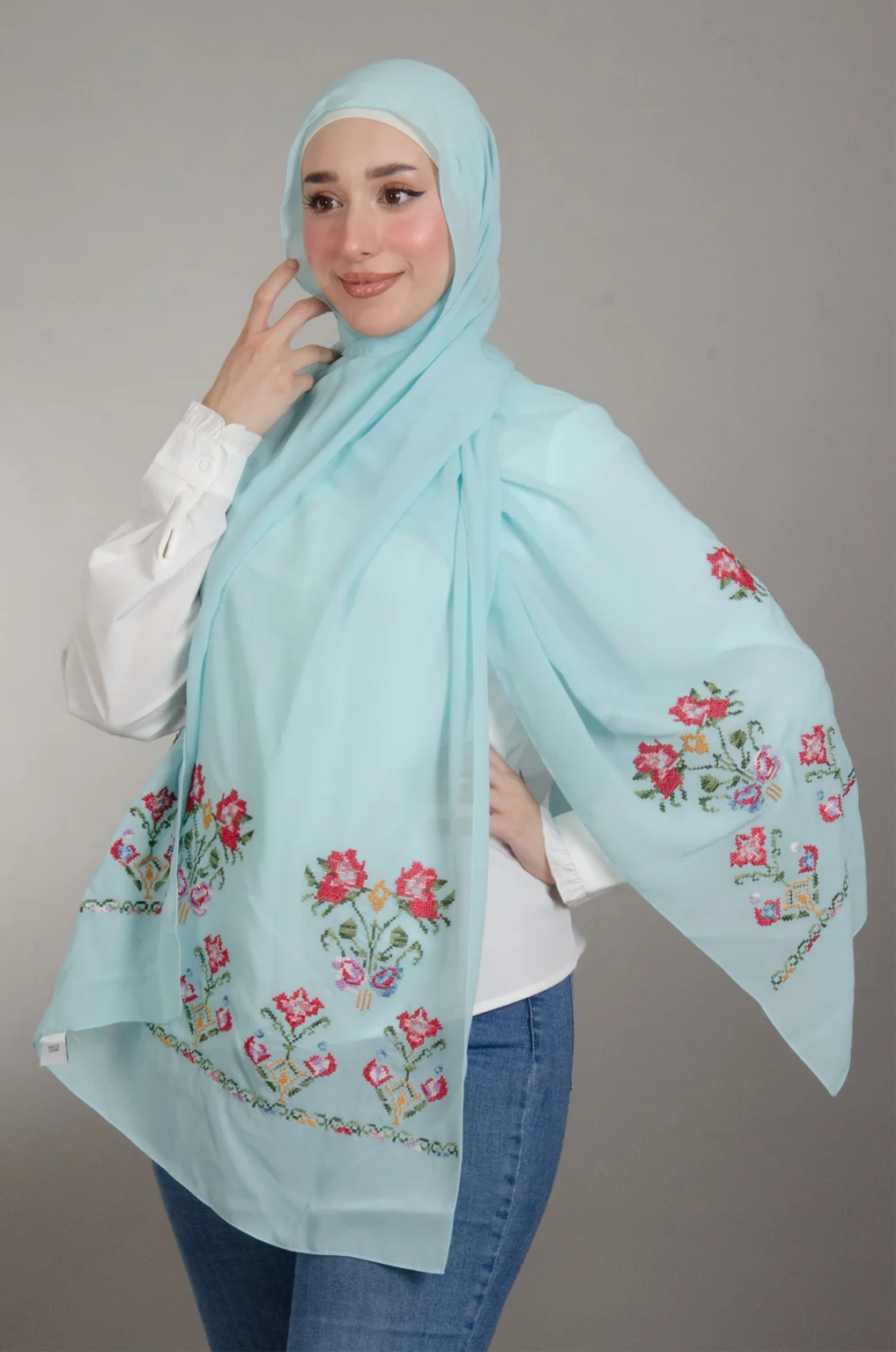 Light Blue Henna Shawl made from Duja Al-Lail cotton chiffon with elegant heritage-inspired Falahi embroidery.
