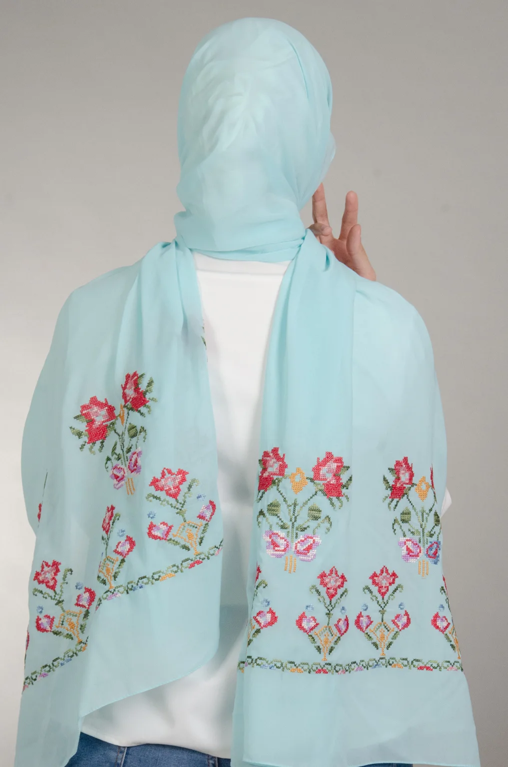 Light Blue Henna Shawl made from Duja Al-Lail cotton chiffon with elegant heritage-inspired Falahi embroidery.